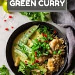 Thai Green Curry served over brown rice in a grey bowl with text overlay for Pinterest.
