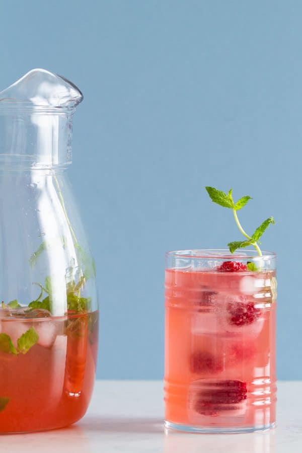 Pink Mint Lemonade in a pitcher and glass