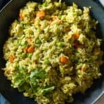 Green rice in a bowl.