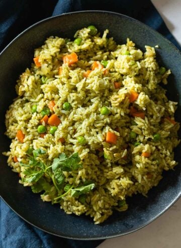 Green rice in a bowl.