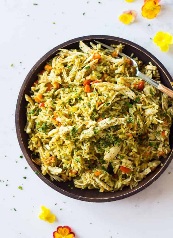 Instant Pot Chicken and Rice close-up on a wooden plate.