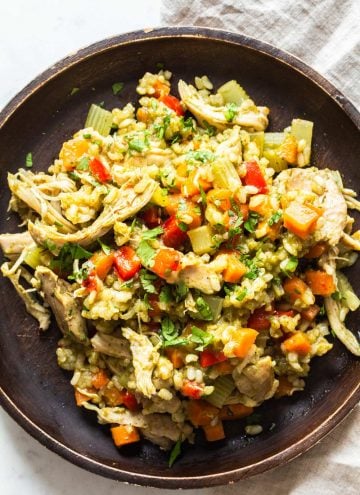 Crock Pot Chicken and Rice on a wooden plate