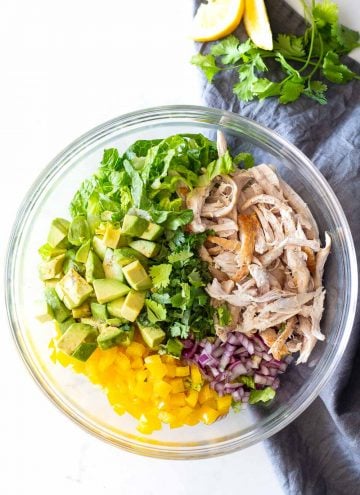 Avocado Chicken Salad deconstructed in a glass bowl