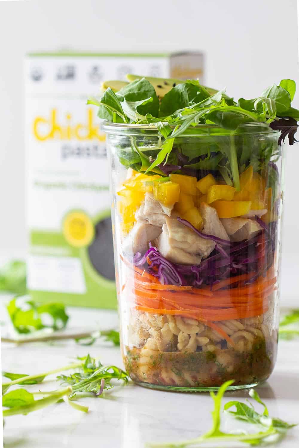 Chicken Pasta Salad Recipe made with gluten-free Chickpea Pasta layered in a glass jar.