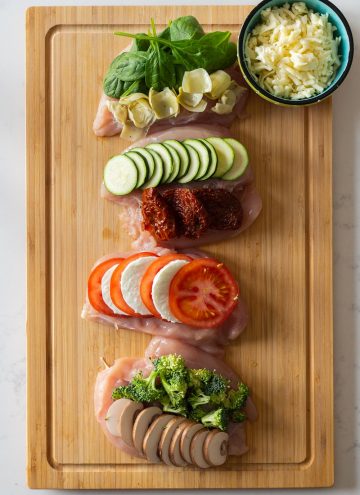 Raw Stuffed Chicken Breast on a cutting board