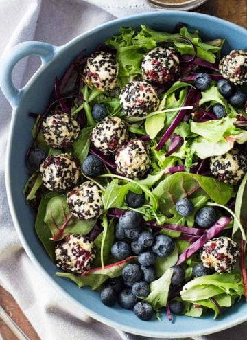 Warm Goat Cheese Salad in blue salad bowl