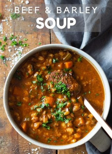 Beef and Barley Soup in a bowl with a spoon