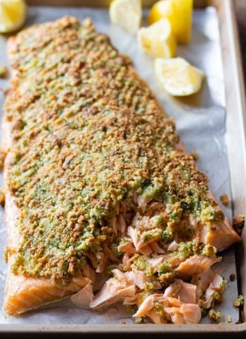 Almond curst baked salmon fillet on a baking sheet