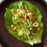 Chicken Lettuce Wrap on a wooden plate