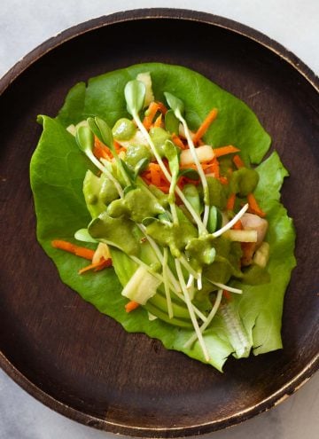 Chicken Lettuce Wrap on a wooden plate