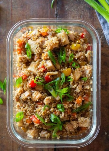 Quinoa fried rice in a glass meal prep container.