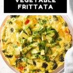 Whole vegetable frittata on a plate with text overlay for Pinterest.