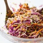 Healthy Coleslaw in a large glass salad bowl.