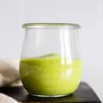 Cilantro Lime Avocado Dressing in a glass jar.