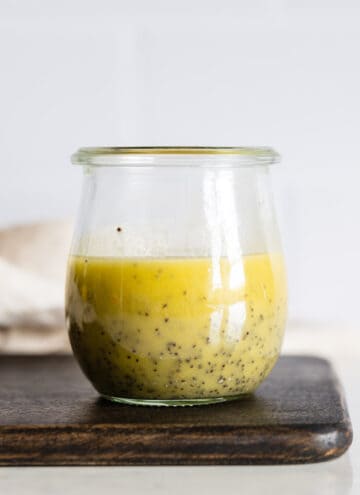 Lemon Poppy Seed Salad Dressing in a small glass jar.
