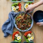 3 different Meal Prep Recipes lined up on a kitchen table.